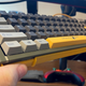 A final photo of the Shurikey Hanzo keyboard in the writer's giant hand.